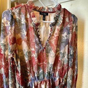 Lovely dress, muted shades, so versatile